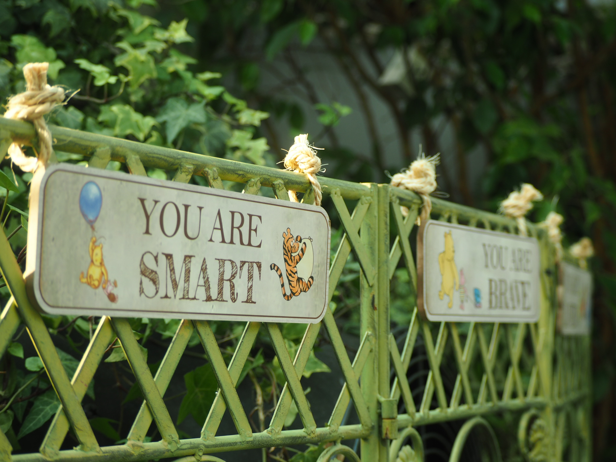 decorative garden gate sign reading you are smart near edmonton